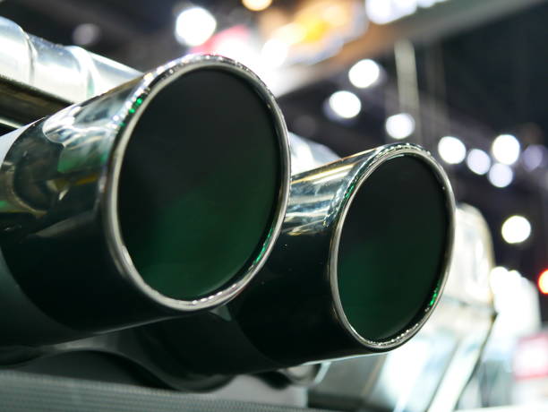 Dual exhaust pipes Chrome, Metal, Pollution, Reflection, Steel exhaust pipe stock pictures, royalty-free photos & images