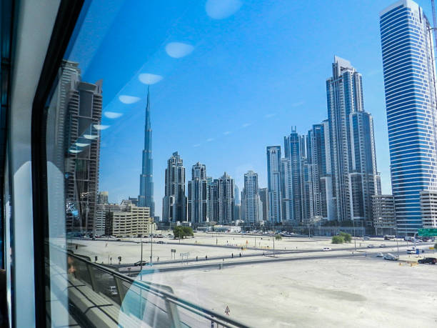 Dubai city skyline view from metro window stock photo