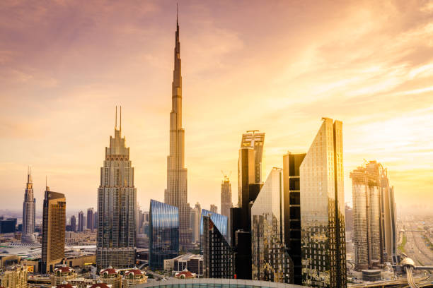 Dubai downtown skyline View of Dubai downtown skyline at sunset united arab emirates stock pictures, royalty-free photos & images