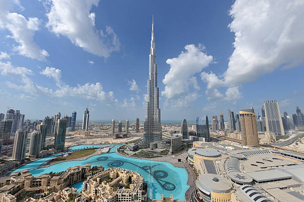 dubai mega city Dubai continue to attract millions of visitors every year to admire the wonder of the city and mega shopping malls.  This view is no longer possible as it was taken from the Address Hotel. burj khalifa stock pictures, royalty-free photos & images