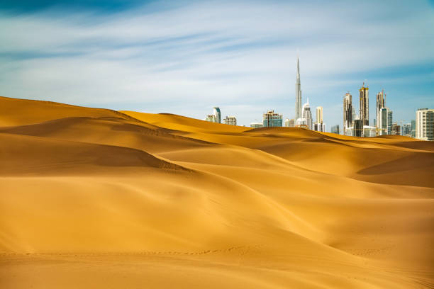 Dubai scenery Looking along desert towards the business district. burj khalifa stock pictures, royalty-free photos & images