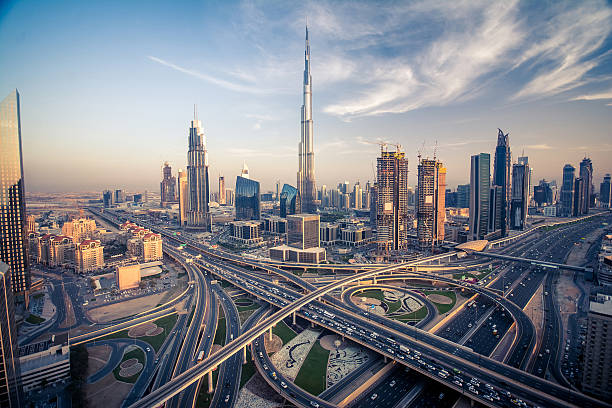 Dubai skyline with beautiful city background Dubai skyline with beautiful city close to it's busiest highway on traffic. Highway from Sarjah to Abudabi. abu dhabi stock pictures, royalty-free photos & images
