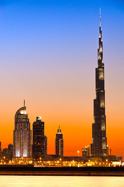 Dubai Skyline with Burj Khalifa at sunset, Dubai. stock photo