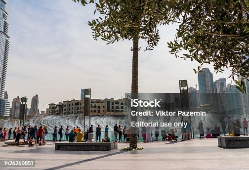 Dubai, UAE - 12.12.2020 Spectators enjoying Dubai fountain show. Travel
