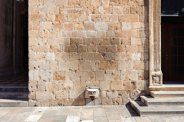 Dubrovnik Franciscan monastery faced stone stock photo