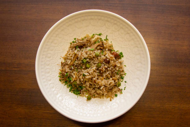 Duck rice with peas and spices Duck rice with peas and spices ariane stock pictures, royalty-free photos & images