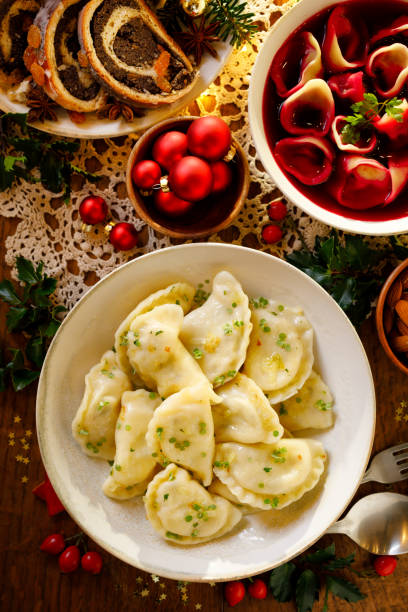 Dumplings with curd cheese and potato filling on a white plate. stock photo