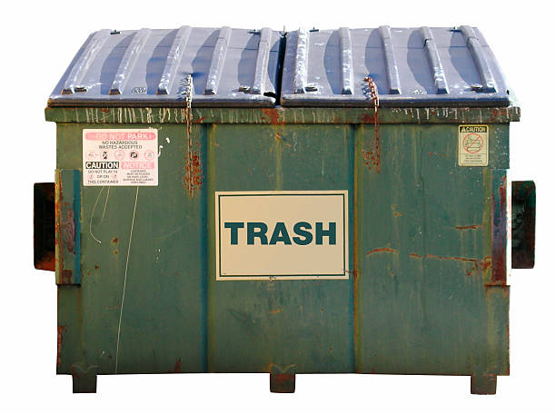 A dumpster with the word trash on the front stock photo