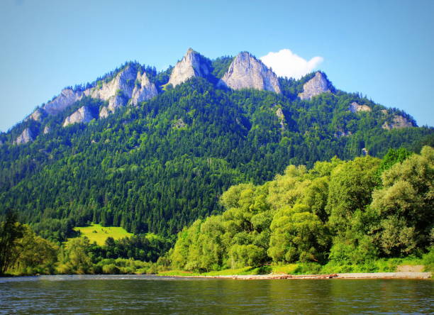 Dunajec river and Three Crowns peak in Pieniny mountains at summer, Poland stock photo