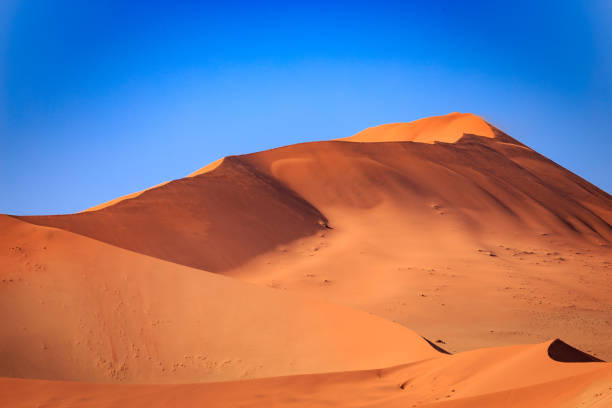 Dunes in Namib Naukluft Park Desert in Front of Blue Sky stock photo