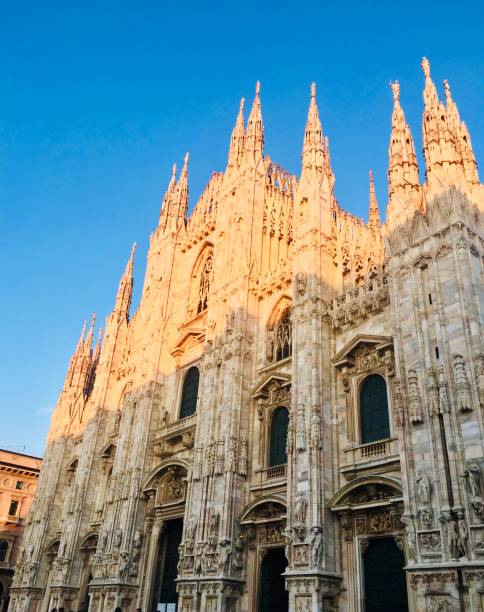 Duomo cathedral of Milano Magnificent facade of Duomo, Milano, Italy duomo santa maria del fiore stock pictures, royalty-free photos & images