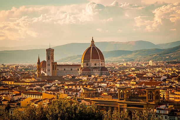 Duomo ? Florence, Italy View of the Duomo Santa Maria del Fiore in Florence, Italy photographed from Piazzale Michelangelo on a late afternoon in August. florence italy stock pictures, royalty-free photos & images