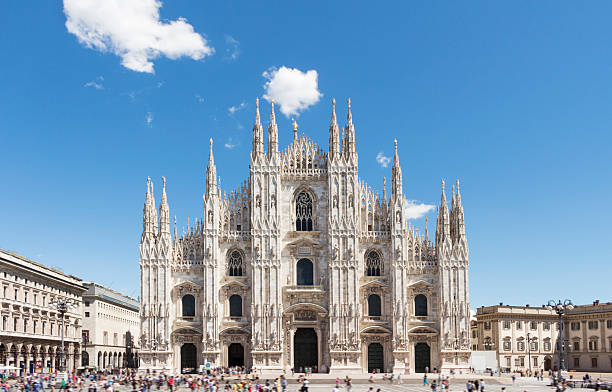 Duomo of Milan, Italy. Piazza del Duomo. Copy space in blue sky. cathedral stock pictures, royalty-free photos & images
