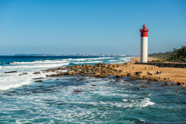 Durban City Lighthouse on a Bright Sunny Day Durban, South Africa - coastline. durban stock pictures, royalty-free photos & images