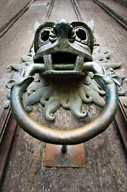 Durham Cathedral Gothic Door Knocker Low angle view of the brass gothic door knocker at the main entrance to Durham Cathedral. Durham Cathedral stock pictures, royalty-free photos & images
