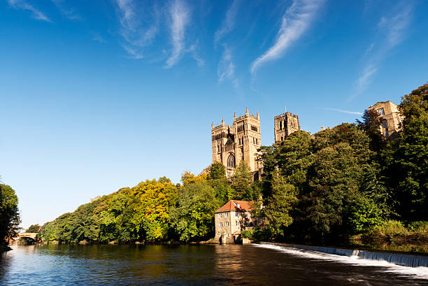 Durham Cathedral on the River Wear in day. Autumnal shot of Durham Cathedral with the River Wear in the foreground. durham stock pictures, royalty-free photos & images