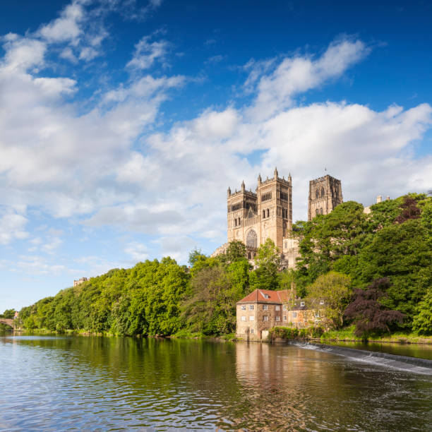 Durham Cathedral Durham Cathedral, on its rocky outcrop above the River Wear, in County Durham, England. county durham england stock pictures, royalty-free photos & images