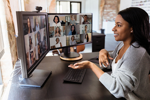 During Covid19 Attractive Woman Gestures During Virtual Meeting With  Colleagues Stock Photo - Download Image Now - iStock