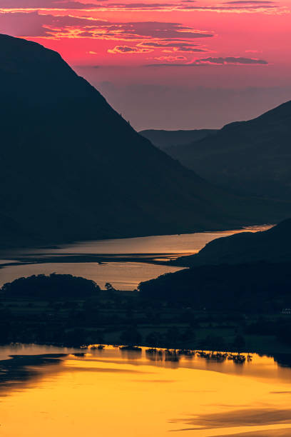 Dusk over mountain valley in Lake District. stock photo
