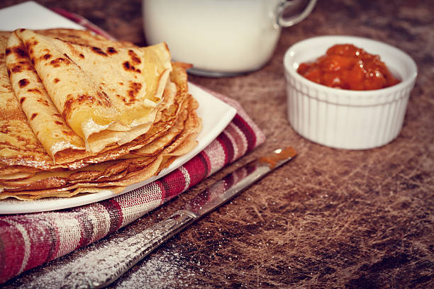 Dutch Pancakes with jam  - Pannenkoeken stock photo
