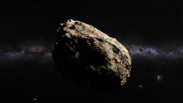 dwarf planet of the asteroid belt lit by Sun and the galaxy stock photo