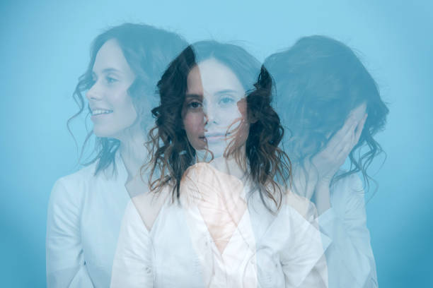 Dynamic triple exposure portrait of a woman, facing three different directions stock photo