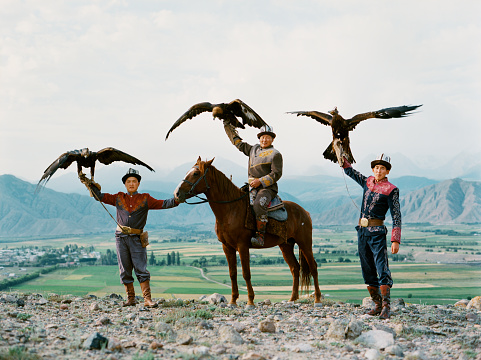 Eagle hunter on horse in steppe  in Kyrgyzstan