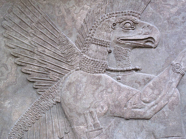 Eagle-Headed Protective Spirit Relief 865-860 BC Assyrian relief 865-860 BC, showing an eagle-headed protective spirit sumerian civilization stock pictures, royalty-free photos & images
