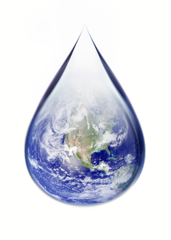 Conceptual computer generated image of a transparent drop of water containing a view of the globe, aligned to the USA.