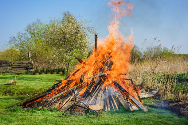 Easter fire on a meadow in spring time stock photo