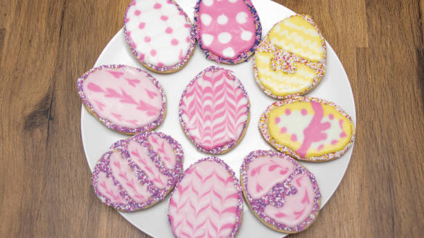 Easter Iced Biscuits in Pastel Shades  easter sunday stock pictures, royalty-free photos & images