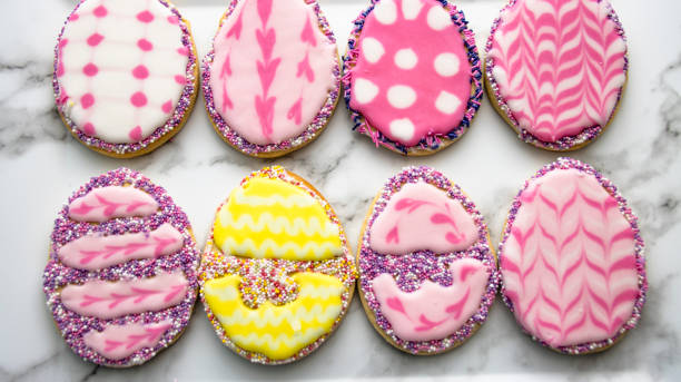 Easter Iced Biscuits in Pastel Shades  easter sunday stock pictures, royalty-free photos & images