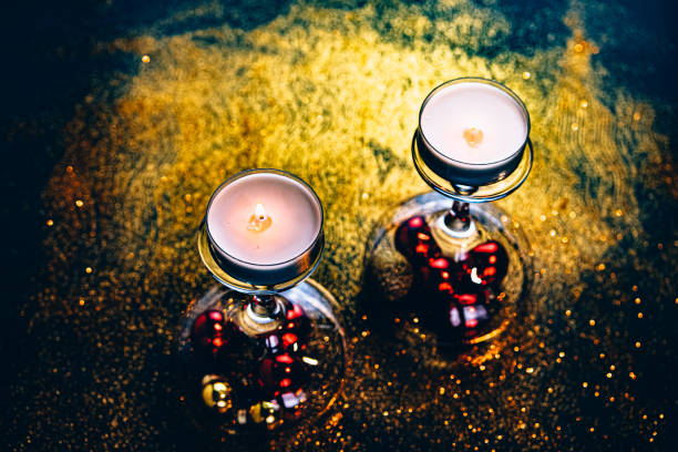 Easy DIY Christmas decoration. Candlestick made of glass and balls. stock photo
