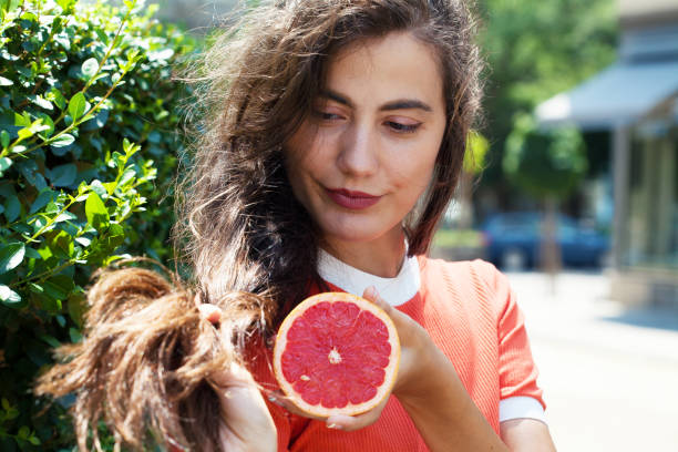Eat one grapefruit a day for healthy hair stock photo