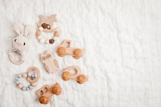 Eco fiendly child wooden toys. Sustainable, developmental, sensory toys for babies and toddlers stock photo