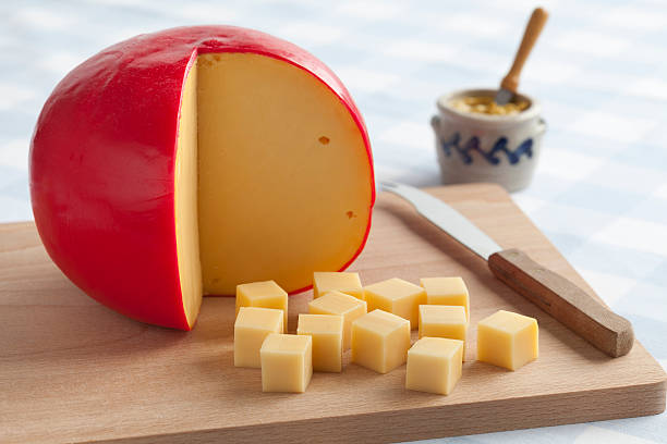 Edam cheese and cubes stock photo