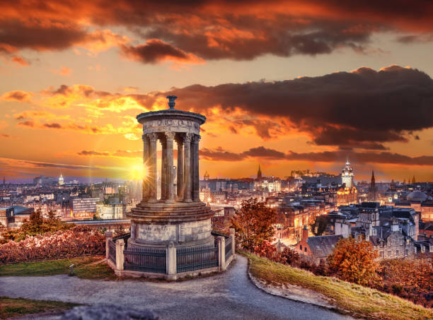 Edinburgh against sunset with Calton Hill in Scotland stock photo