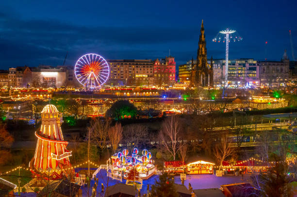 Edinburgh Christmas market, focal point of Edinburgh's Christmas and hogmanay celebrations 2019, at dusk.