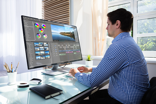 Editor Editing Video On Computer Stock Photo Download Editor Editing Video On Computer Stock Photo Download