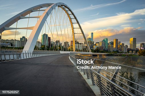 istock Edmonton, Alberta, Canada skyline at dusk with suspension bridge in foreground and clouds 1177520257