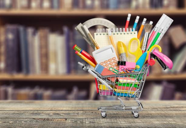 Education. Stationery objects in mini supermarket cart office supply stock pictures, royalty-free photos & images