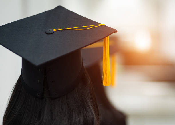 Education stock photo Review of the success university graduate hat during commencement. Concept of successful in education. University congratulation ceremony. Education stock photo. MBA stock pictures, royalty-free photos & images
