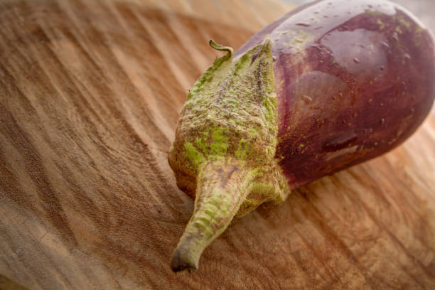 eggplant on a wooden background stock photo