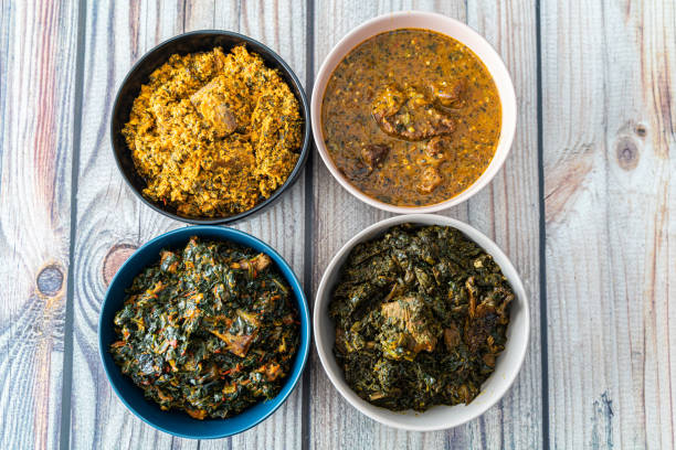 Egusi Ogbonno Vegetable and Afang soup - Nigerian sauces and soups stock photo