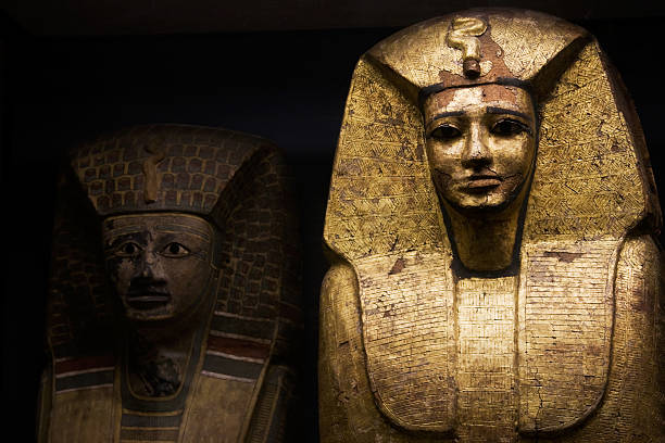 Egyptian sarcophagus used for ancient pharaohs Egyptian Pharaohs sarcophagus on black background antiquities stock pictures, royalty-free photos & images