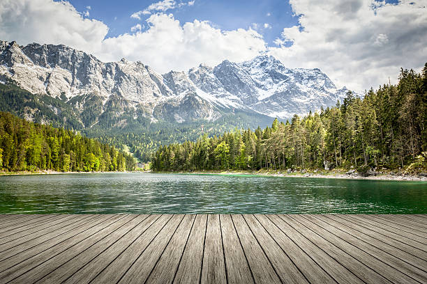 Eibsee Zugspitze An image of the Eibsee and the Zugspitze in Bavaria Germany jetty stock pictures, royalty-free photos & images