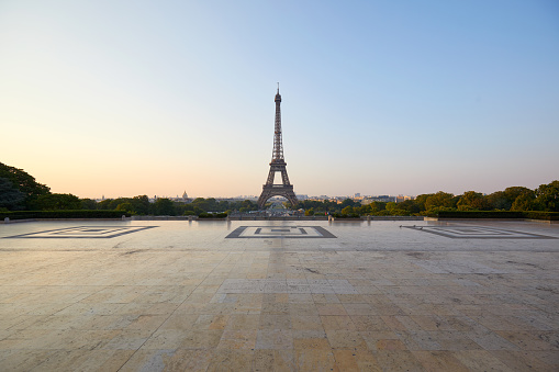 Eiffel tower and empty Trocadero square, nobody in a clear summer morning in Paris, France