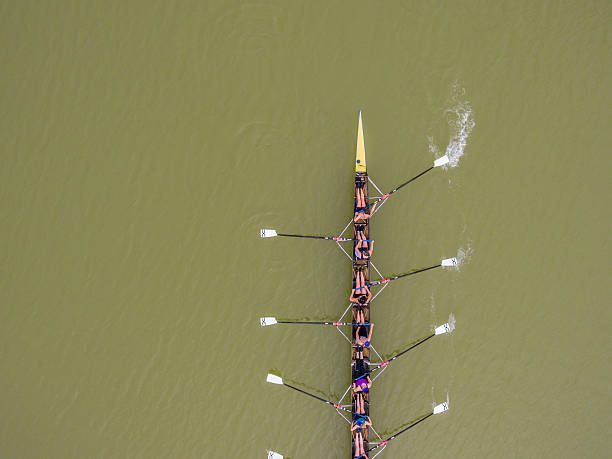 Eight rowing team boat aerial view stock photo