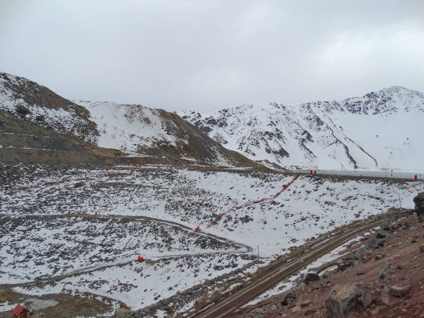 El Yeso dam region winter landscape in Chile stock photo