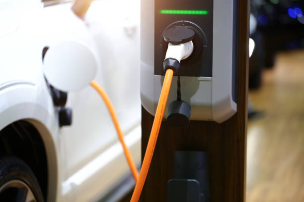 Electric car charging. Electric car charging. electric vehicle charging station photos stock pictures, royalty-free photos & images